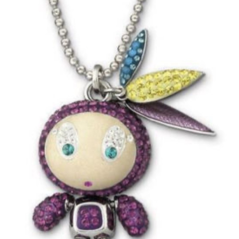 Authentic Swarovski Indian American feather 🪶 Cutie purple